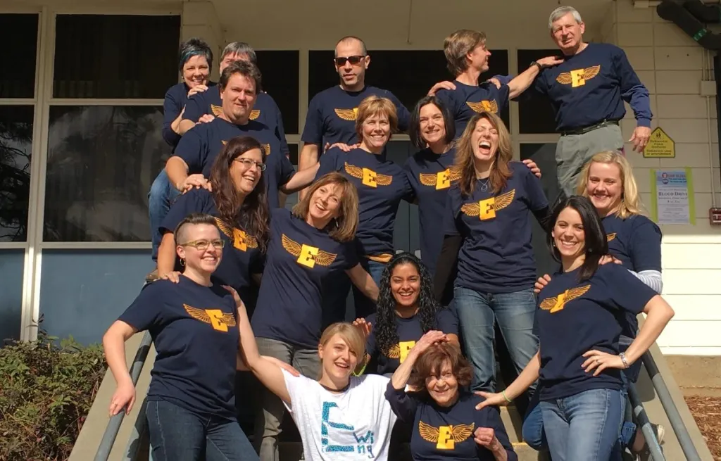 Customers group photo on stairs
